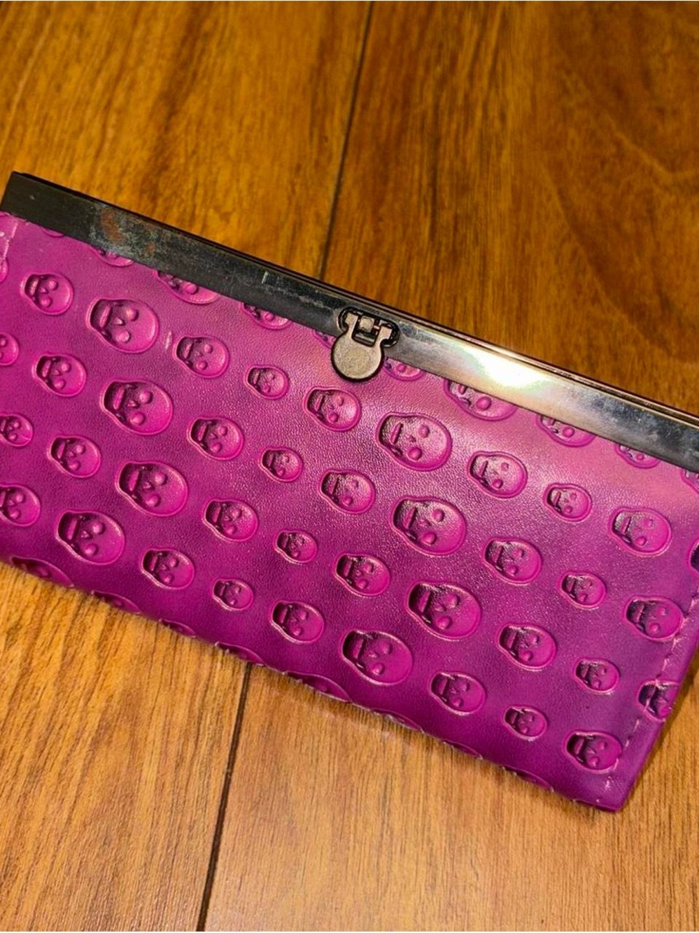 Pink skull wallet with black accents
